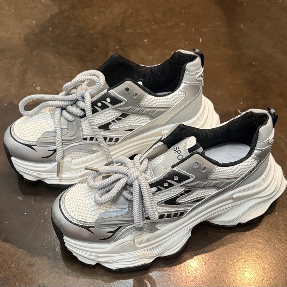 Stylish White and Black Sneakers